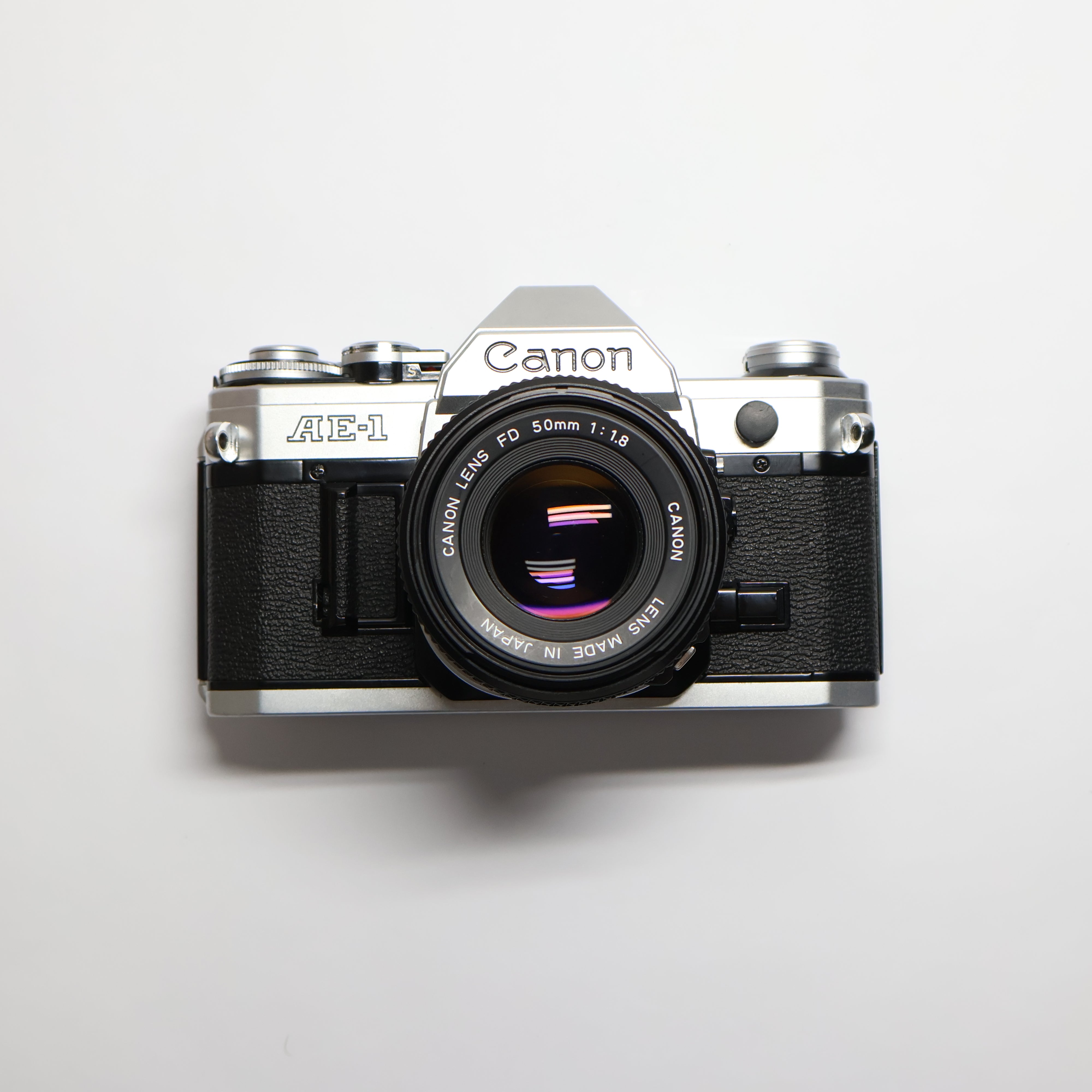 Canon AE-1 & 50 mm 1 store : 1.8 Canon Made in Japan Lens